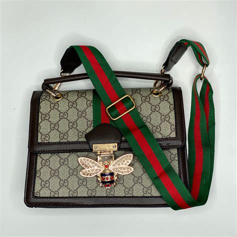 gucci bag strap with bee|Gucci bag with bee clasp.